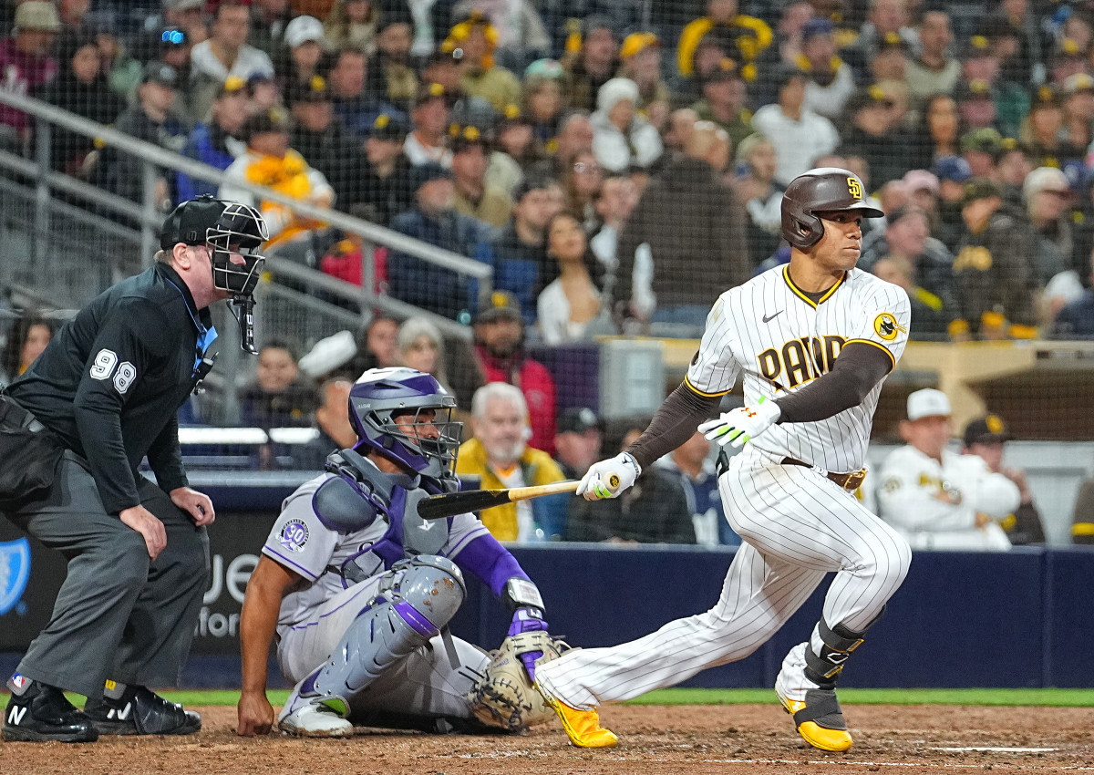 Juan Soto swings at a pitch during a game in 2022.